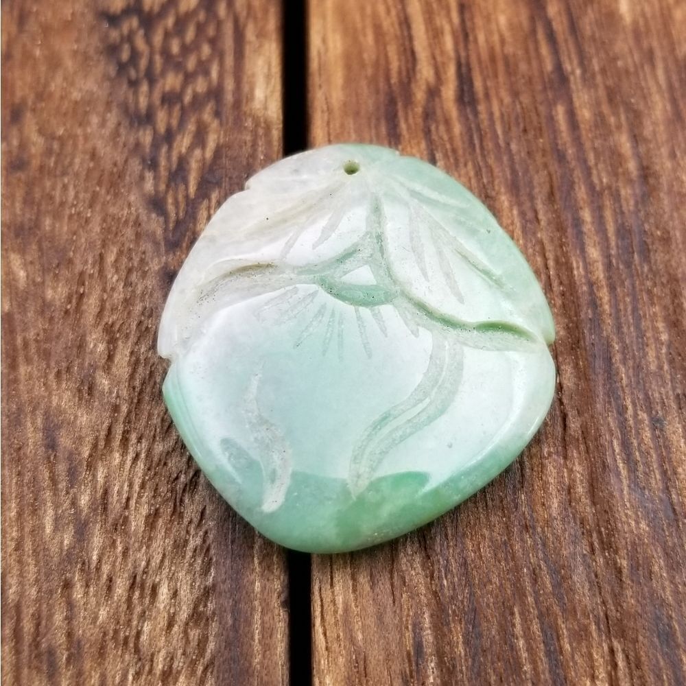 Carved green jade earth healing   pendant